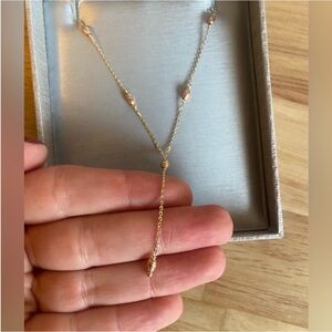 Elegant Gold Necklace with Rose Accents